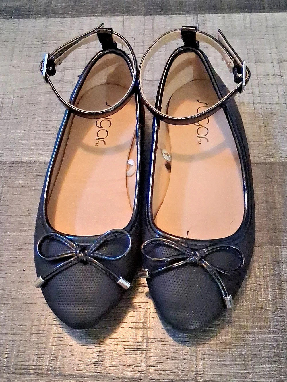 Bow Ankle-Strap Flats in Black